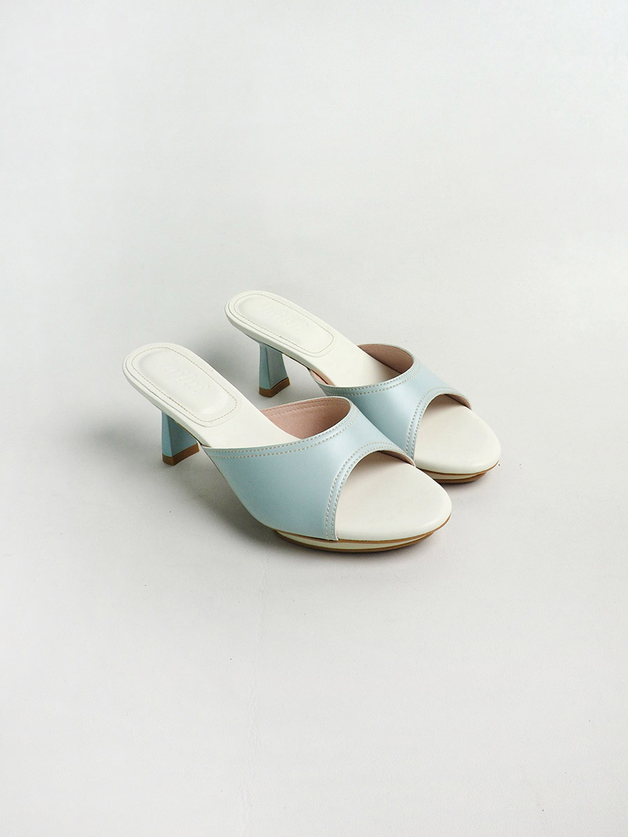 CELESTA mules with platform SKY